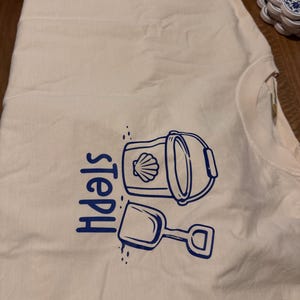 The shirt was as advertised. The Fit of the Comfort shirt is just right, not oversized or smaller. The quality is great and the graphic on the shirt is vibrant. I can’t wait to wear it on vacation.
